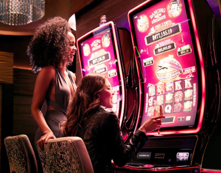 Filipino player watching a live dealer baccarat stream on a mobile phone
